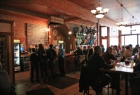 The busy and friendly staff taking orders at the bar at Shorts