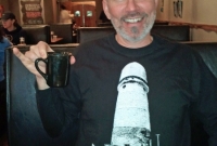 Chuck Marshall showing off his Ypsi  t-shirt at the Poppycock restaurant