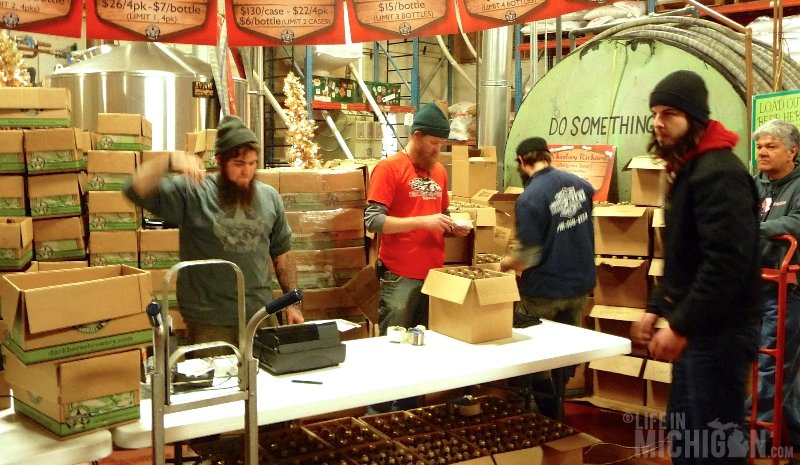 Aaron and Wiggs selling beer