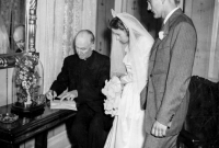 Betty and L.Dean Signing the license