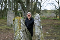 Brenda with standing stones at Clava cairn